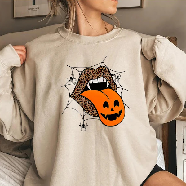 Referencia visual: Halloween-dtf-hoodies.webp